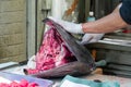 Japanese street food vendor cutting tuna at Tsukiji market in Tokyo