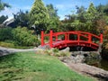 Japanese style bridge in a garden Royalty Free Stock Photo