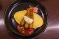 Japanese style fried rice omelet Omurice with deep fried shrimp Royalty Free Stock Photo