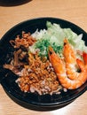 Japanese style noodle topped with minced pork sauce and prawn.