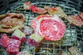 Japanese style Raw fresh beef on hot barbecue grill . Royalty Free Stock Photo