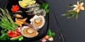 Japanese style seafood dish with king prawns and scallops.