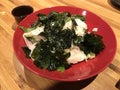 Japanese style tofu salad topping with seaweed and furikake. Royalty Free Stock Photo