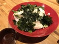 Japanese style tofu salad topping with seaweed and furikake. Royalty Free Stock Photo