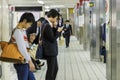 Japanese on a Subway PLatform