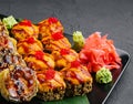 Japanese sushi assorted on a black stone plate Royalty Free Stock Photo