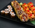 Japanese sushi assorted on a black stone plate Royalty Free Stock Photo