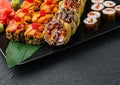 Japanese sushi assorted on a black stone plate Royalty Free Stock Photo