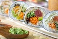 Japanese sushi burrito roll served with wasabi