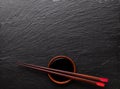 Japanese sushi chopsticks over soy sauce bowl Royalty Free Stock Photo