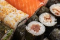 Japanese sushi food. Maki ands rolls with tuna, salmon, shrimp, crab and avocado. Top view of assorted sushi, all you can eat menu Royalty Free Stock Photo
