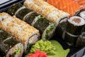 Japanese sushi food. Maki ands rolls with tuna, salmon, shrimp, crab and avocado. Top view of assorted sushi, all you can eat menu Royalty Free Stock Photo