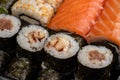 Japanese sushi food. Maki ands rolls with tuna, salmon, shrimp, crab and avocado. Top view of assorted sushi, all you can eat menu Royalty Free Stock Photo