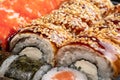 Japanese sushi food. Maki ands rolls with tuna, salmon, shrimp, crab and avocado. Top view of assorted sushi, all you can eat menu Royalty Free Stock Photo