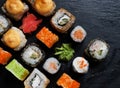 Japanese sushi food. Maki ands rolls with tuna, salmon, shrimp, crab and avocado Royalty Free Stock Photo