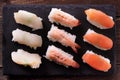 Japanese sushi food selection black slate platter row