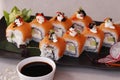 Japanese sushi rolls with tuna, cream cheese, salmon and soy sauce Royalty Free Stock Photo