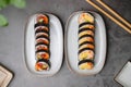 japanese sushi rolls with tuna, egg, and avocado. Top view of assorted sushi rolls. Japanese traditional food Royalty Free Stock Photo