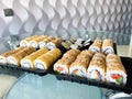 Japanese sushi set. Set of sushi rolls in a plastic box, delivered home ready to eat fast healthy food Royalty Free Stock Photo
