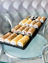 Japanese sushi set. Set of sushi rolls in a plastic box, delivered home ready to eat fast healthy food Royalty Free Stock Photo