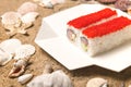 Close up of Japanese Sushi Roll with tuna, avocado wrapped in nori seaweed and rice served with red flying fish roe Tobiko caviar Royalty Free Stock Photo