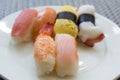 Japanese sushi on a white plate with selective focus Royalty Free Stock Photo