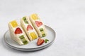 Japanese sweet fruits sandwich with strawberry, pineapple and kiwi