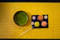 Japanese sweets and green tea that has been placed on the tatami