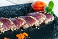 Japanese tataki served on black tile. Royalty Free Stock Photo