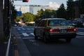 Japanese Taxi driving on the street in Tokyo, Japan