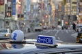 Japanese taxi sign on a vehicle in tokyo