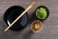 Japanese tea ceremony setting on wooden bench. Royalty Free Stock Photo