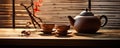 Japanese teapot on wooden table. Tea cups Royalty Free Stock Photo