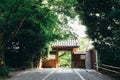 Japanese temple with japanese maple tree leaves in Kyoto vintage film style Royalty Free Stock Photo