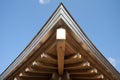 Japanese temple roof against blue sky. Royalty Free Stock Photo