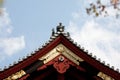 Japanese temple roof against blue sky. Royalty Free Stock Photo