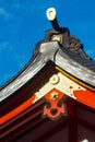 Japanese temple roof with blue sky in the background Royalty Free Stock Photo