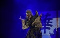 Japanese theater actors perform oriental dance in masks