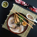 Japanese tonkotsu ramen, pork bone broth noodles top view