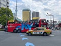 Japanese tour bus overlooking Tokyo Skytree Royalty Free Stock Photo