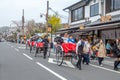 japanese tourists like to go on a sightseeing trip by rickshaw in Kyoto