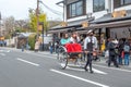 japanese tourists like to go on a sightseeing trip by rickshaw in Kyoto