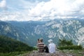 Japanese tourists photograph the panorama