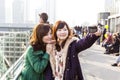 Japanese tourists take self-portraits
