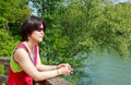 Japanese tourists walk on the banks of the Marne