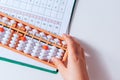 Japanese traditional abacus soroban isolated on white background