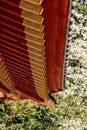 Japanese traditional architecture. The elegant construction of the Japanese temple of red and gold beams Royalty Free Stock Photo