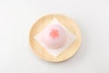 A Japanese traditional  confectionery cake wagashi on plate on white background Royalty Free Stock Photo