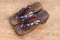 Japanese traditional geta sandal on wooden floor. Traditional Japanese asian wood footwear called Geta Royalty Free Stock Photo