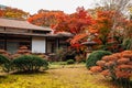 Japanese traditional house with autumn maple trees at Koishikawa Korakuen Garden in Tokyo, Japan Royalty Free Stock Photo